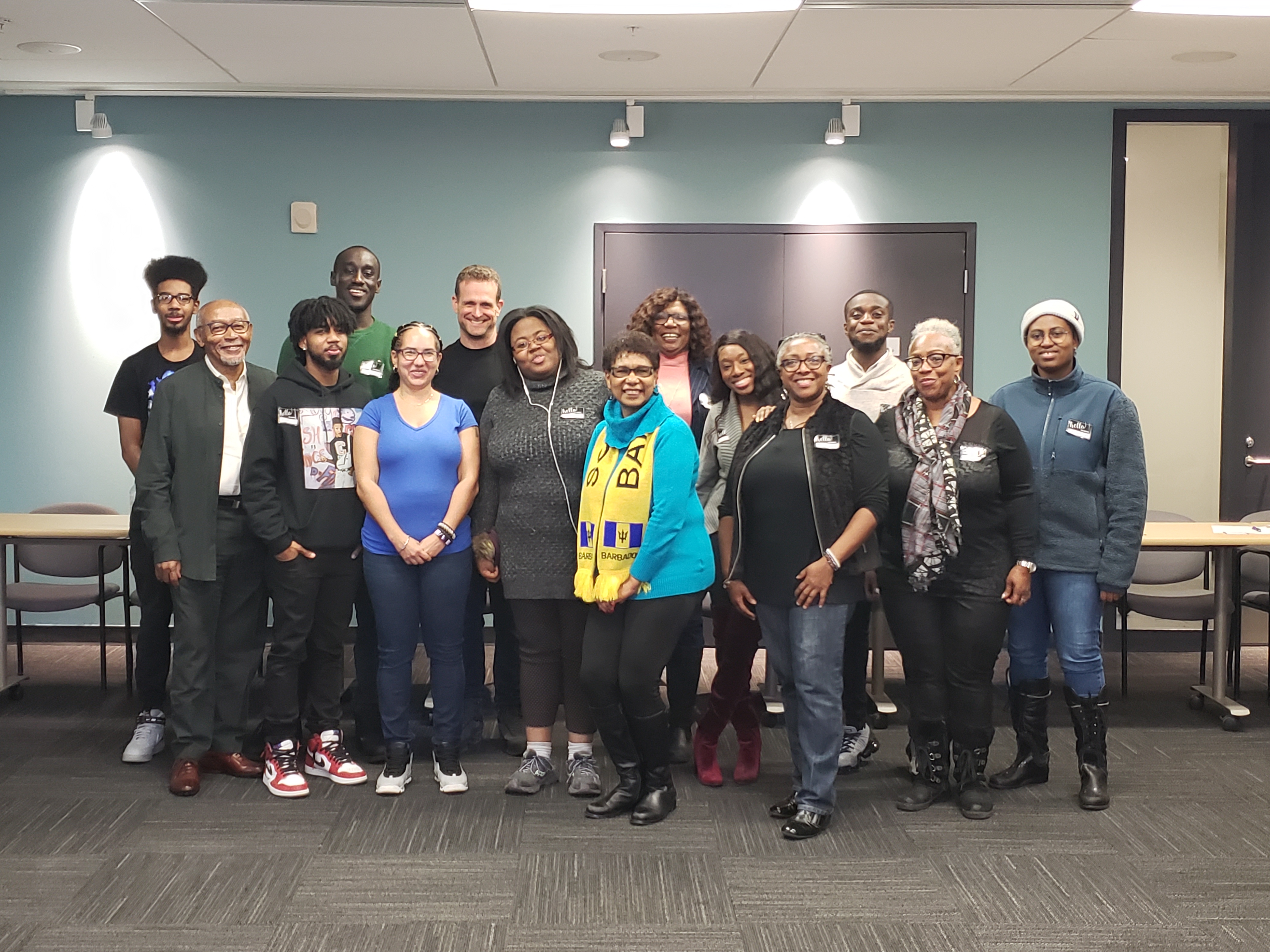 Photo of PCK's Andrew Currier and Jillian Carter with youth participants and organizers at the IP workshop for Roots Community Services in Brampton Ontario