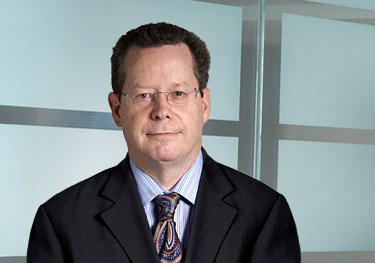 Headshot of Gregory C. Ludlow, a trademark agent and lawyer