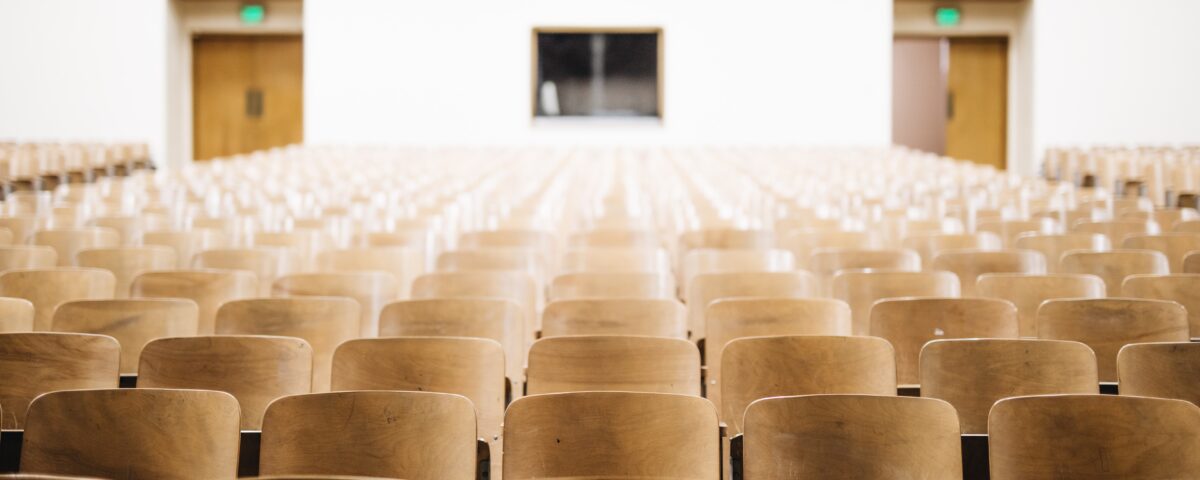 Photography of empty seats in a university lecture hall